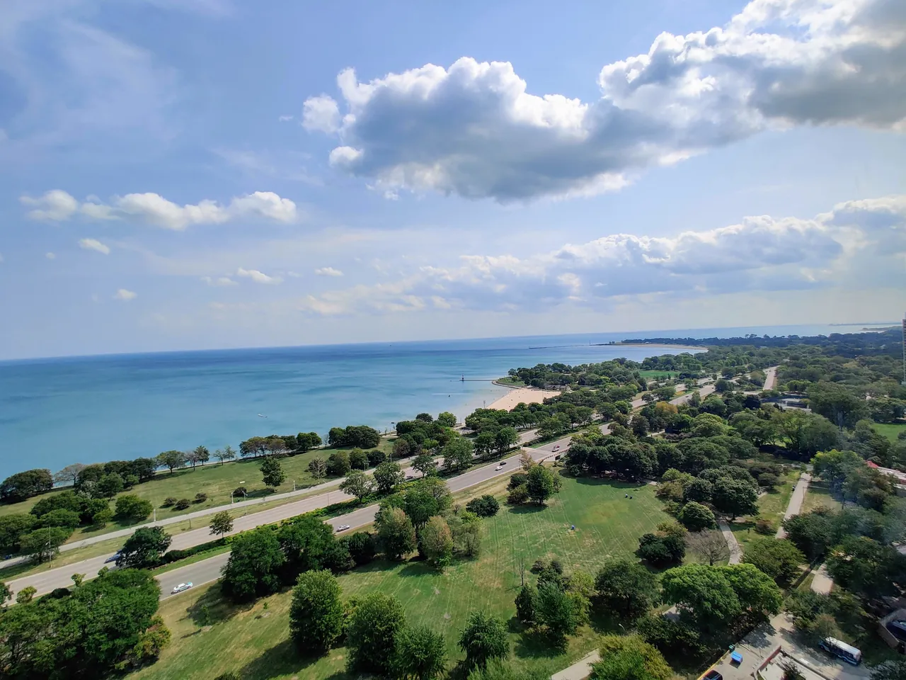 Lake Michigan shoreline, beach and lakefront park seen from a North Side high-rise